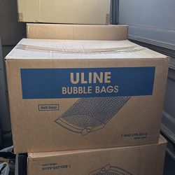 Boxes of women’s xs-small clothes