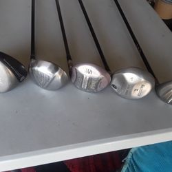 5 Vintage Golf Clubs...