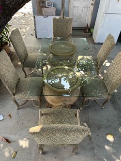 Neoclassical dinning table with 6 chairs (glass top)