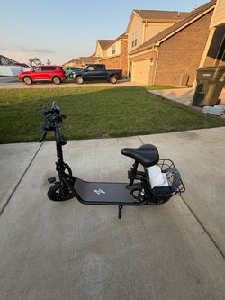E scoter with seat