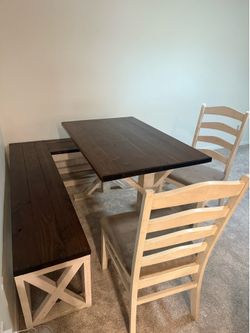 Table, bench, and chairs