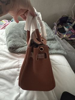 Walmart dupe hundred percent real leather never used comes with lock key and strap