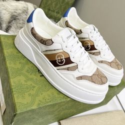 WOMEN'S GUCCI EMBOSSED SNEAKER