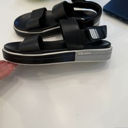 Prada Logo Embossed Rubber Trimmed Leather Sandals Black