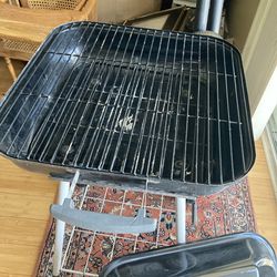Charcoal grill with wheels for $25