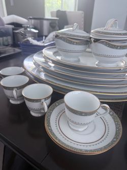 White Porcelain Dinnerware Set with Gold Trim