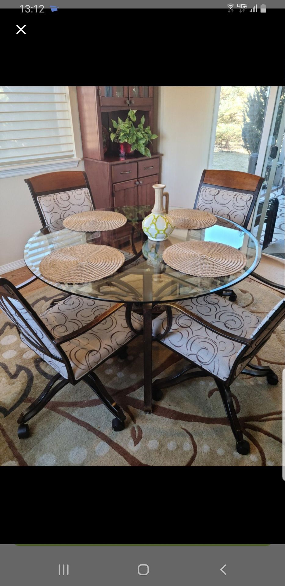 4 Swivel Iron Upholstered Chairs & Glass Top Table