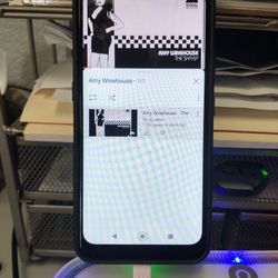 Simi New LG K 22 Boost . Hair Line Crack You Can Barely See But Other Than That The Phone Works Great
