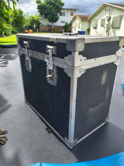 heavy-duty ATA-style flight case or road trunk, commonly used for transporting music,