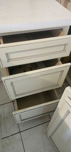Wood cabinets.some with marble on top.