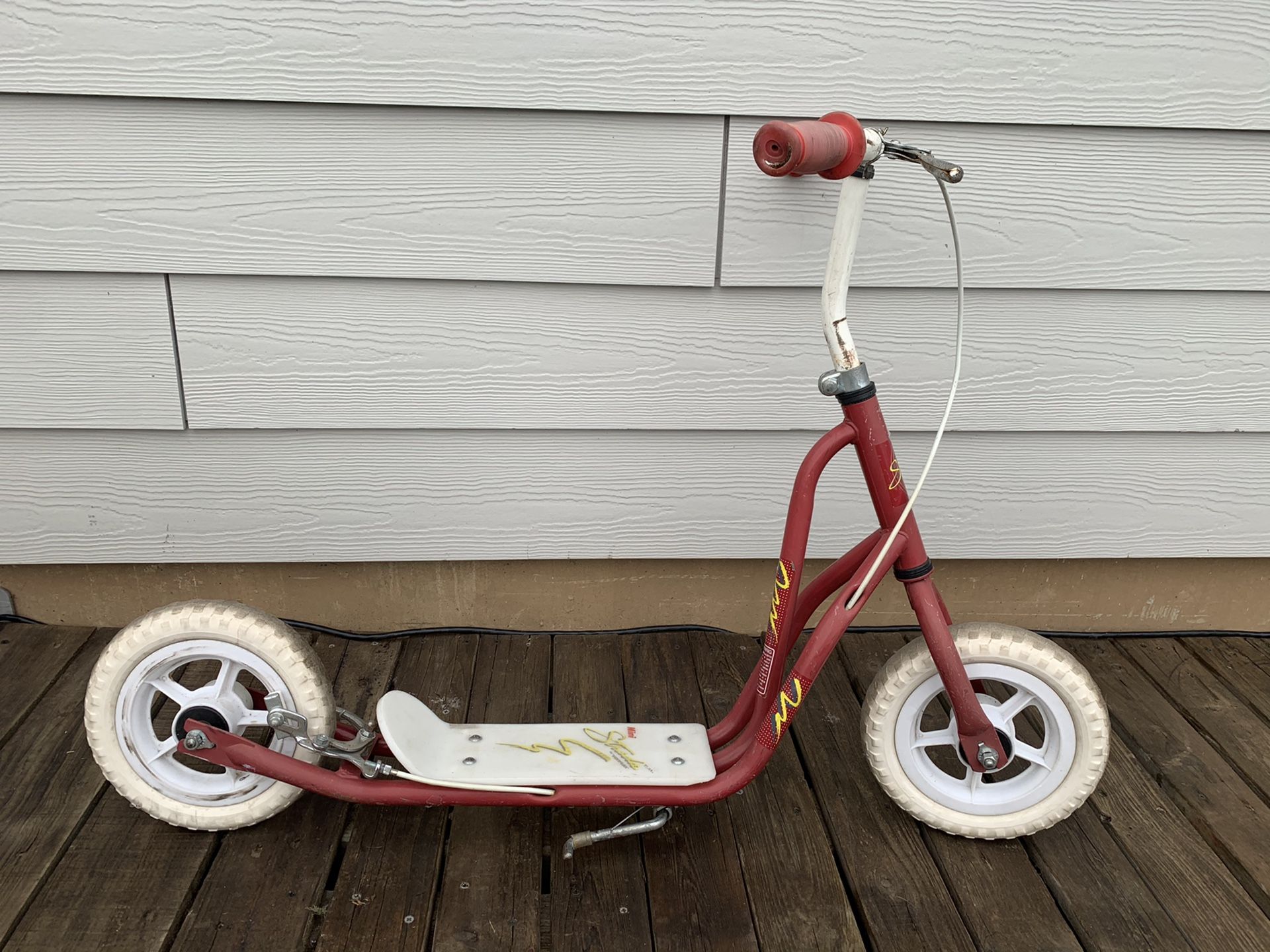 A vintage Kids Veriflex Strada Scooter