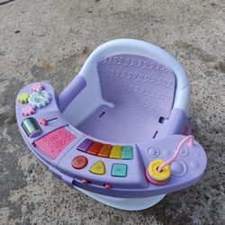 LikeInfantino Music & Lights 3-in-1 Discovery Seat & Booster, Toddler Booster Seat for Dining or Kitchen Chair, Baby Center & Snack Tray, $30