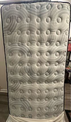 Sealy Frisco  Medium Euro Pillow Mattress $1.300 retail  plus wood bed frame $150  Twin  setup in excellent condition.