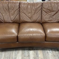 Beautiful brown leather sofa and matching oversized chair in great condition.