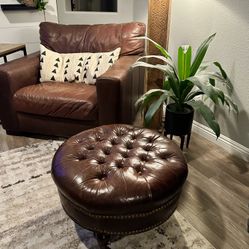 Leather Tufted Ottoman On Brass Casters