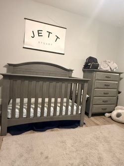 Gray crib and dresser set
