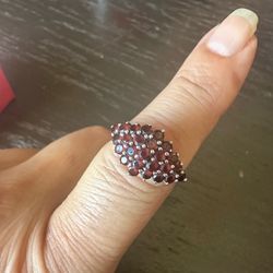 925 Sterling Silver cluster of round genuine garnets ,size 9, marked NE 925 , gorgeous ring !!