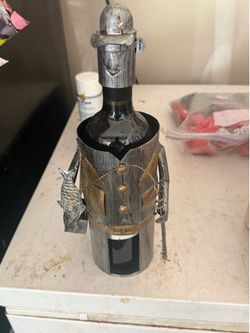 Wine bottle fisherman holder.