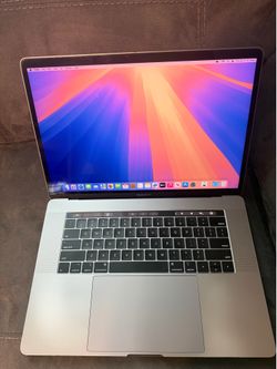 MacBook Pro 15 Inch 2019 Touch Bar very fast i9 16 GB 512 GB  SSD with fingerprint sensor