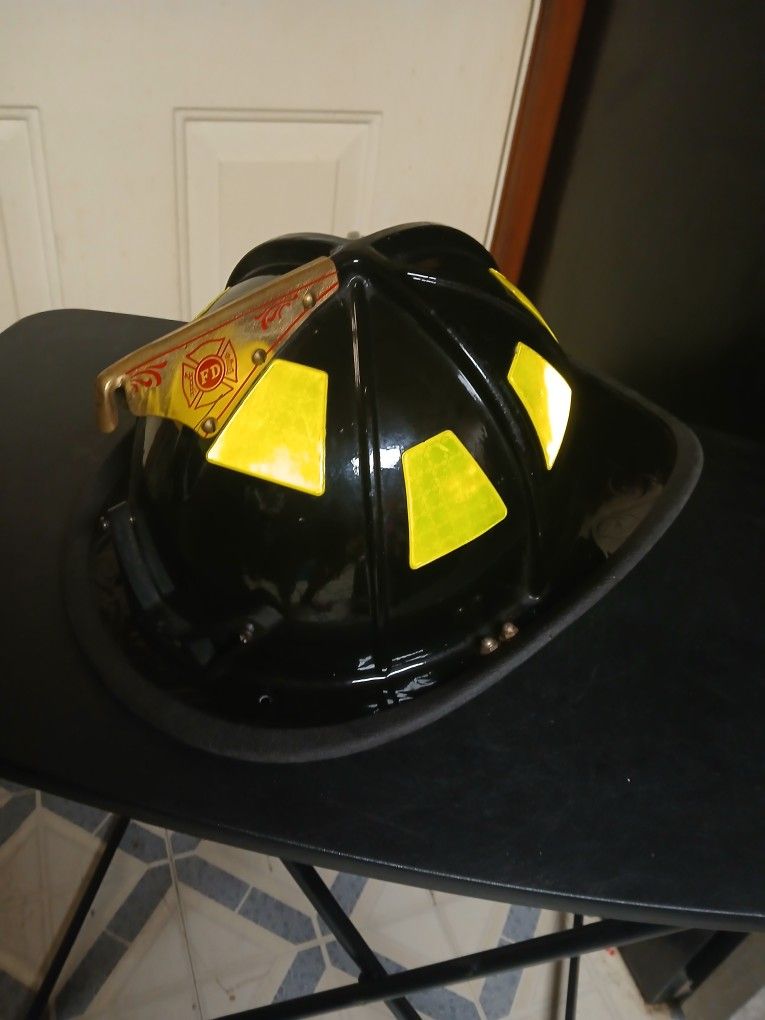 Fireman helmet One size fits all 300 Hundred   Dollars 