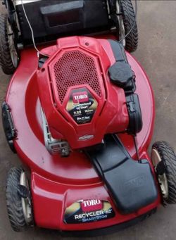 Toro Recycler 22" Self-Propelled  Smart Stow 7.25 Mow n Stow with Grass Bag