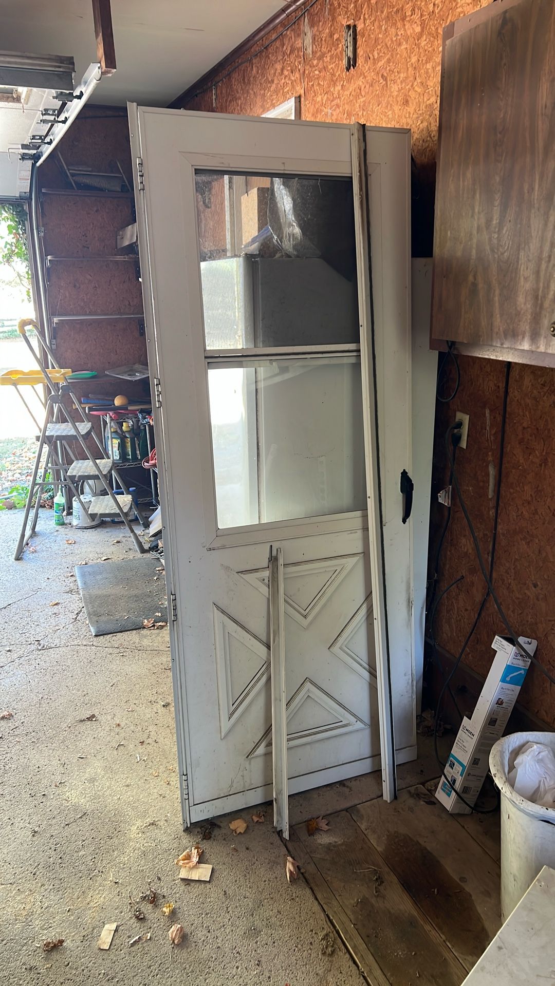 Storm Door With Sliding Screened Top Window