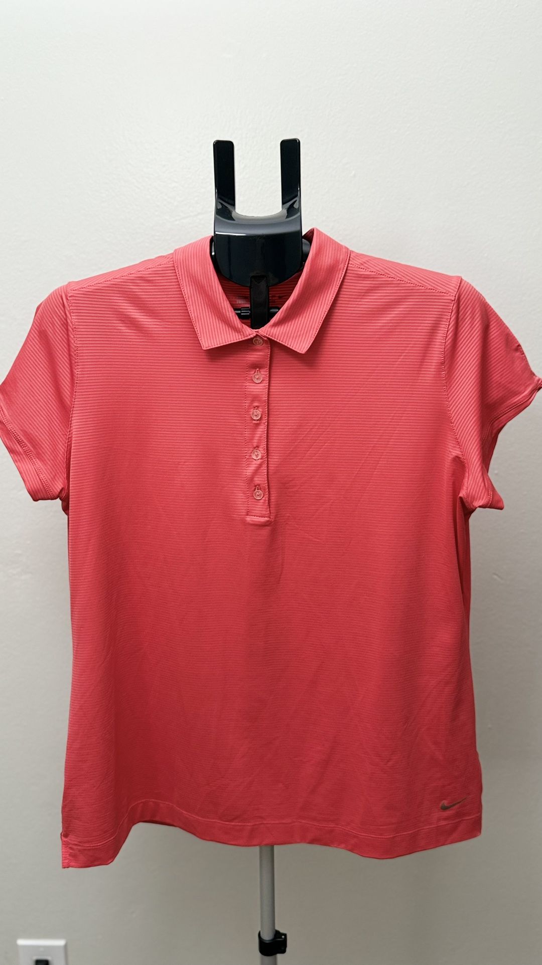 Nike Golf Dri-Fit polo in size XL.