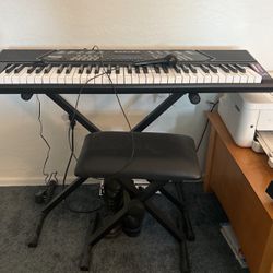 Electric Keyboard With Seat