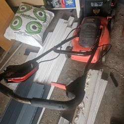 (2) Black & Decker Electric Lawn Mowers