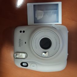 Instax Mini 11 camera . I think its about $100 bucks at Target .