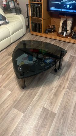 Black glass living room table with 2 matching side tables
