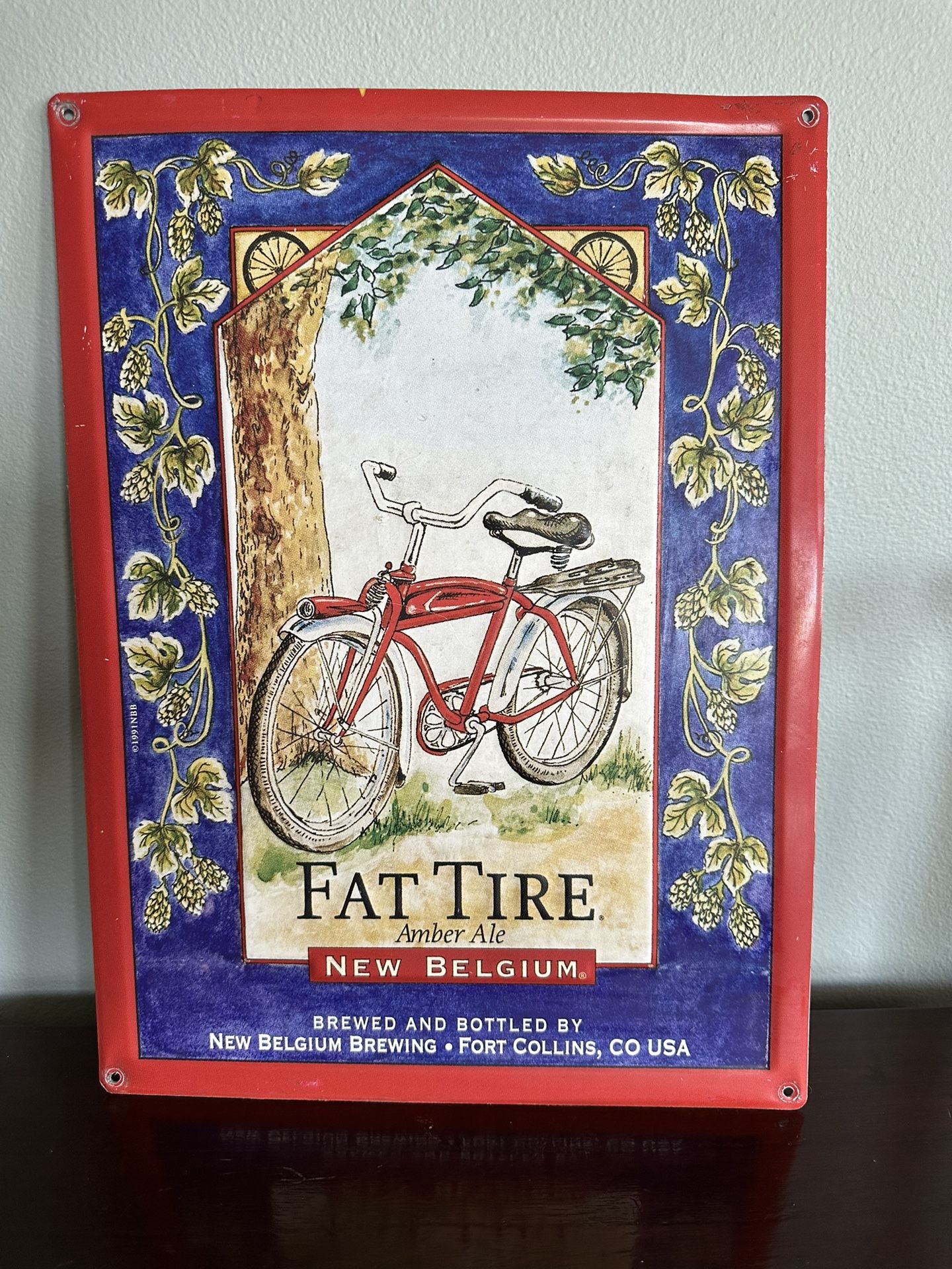 1991 Fat Tire Amber Ale Beer New Belgium Brewing Embossed Metal Sign 16x12”