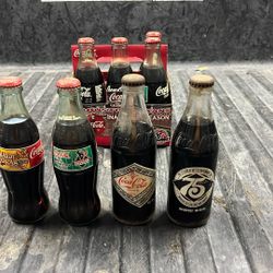 Old full Coca Cola Bottles 3$ each