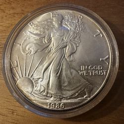🦅 1986 American Silver Eagle – INAUGURAL YEAR – High-Grade MS70 Candidate! 💎