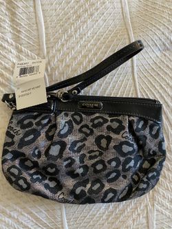 Lux black cheetah print Coach wristlet