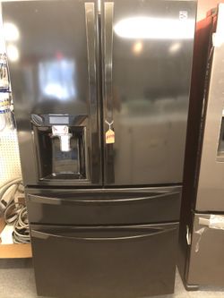 New scratch and dent kenmore black French door fridge fridge with bottom freezer. 1 year warranty