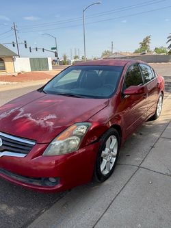 2009 Nissan Altima Red 4-Door Sedan