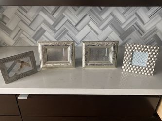 Four fabulous silver frames