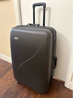 Luggage LARGE 32x12x20”. 4 wheels. - wheels are good but top robber is pealing.