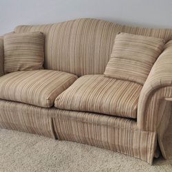 Nice Tan Couch With Line Design. 