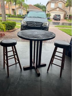 Table and two bar stools