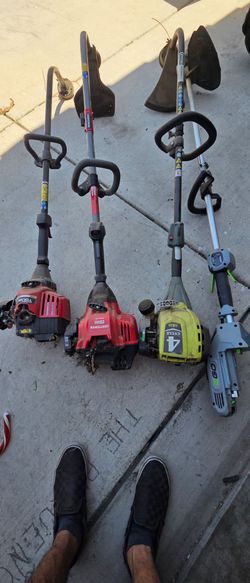 4 weed wackers 3 gas 1 battery powered