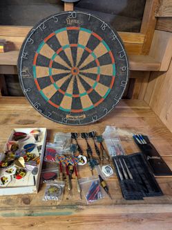 Vintage dartboard and darts