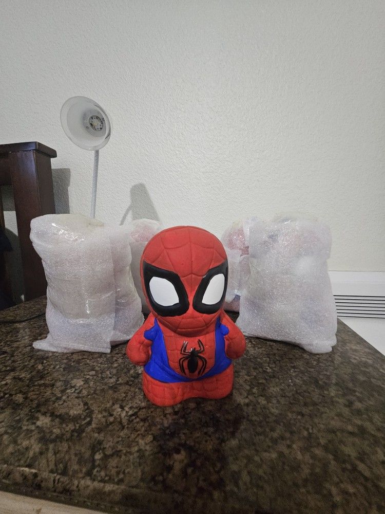 Spidey Piggy Banks.