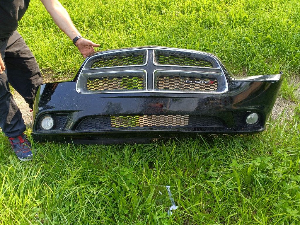Front bumper and grill assembly for a 2011-2014 Dodge Charger