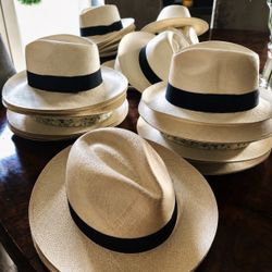 Bulk inventory of high-quality Panama hats, fashion hats, and sunglasses for sale.