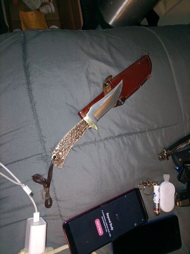UNCLE HENRY WITH LEATHER CASE
