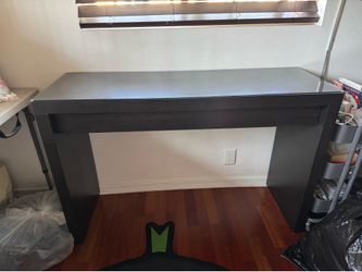 IKEA wooden desk with wheels