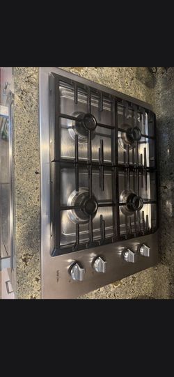 Gas four burner Maytag Stove