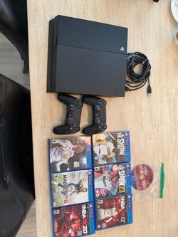 PS4 with 6 games and 2 controllers
